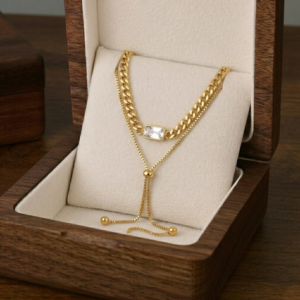 سلسلة ستانلس ستيل دهبي بتصميم طبقات وحجر مستطيل